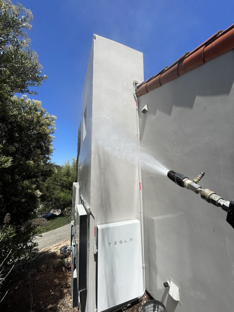 WashPro SFV technician soft washing a home exterior in Los Angeles County